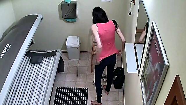 Young mom in solarium