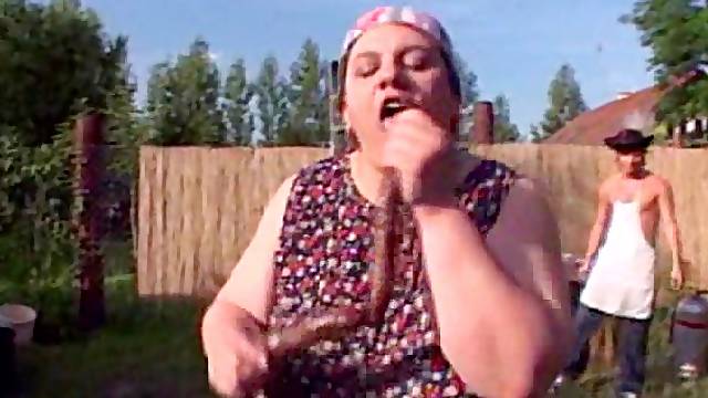 Mature fat farm woman gets her pussy pounded outdoors